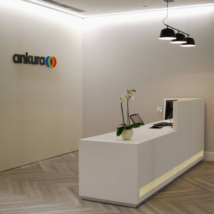 01 Ankura - Company signage, bespoke reception desk and parquet floor finish - high quality design & build
