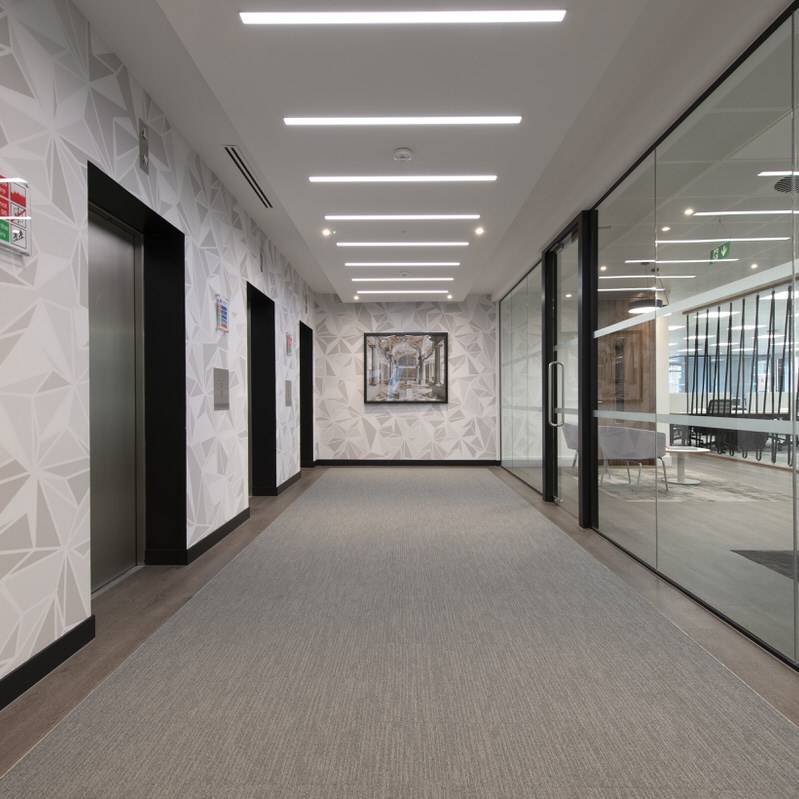 01 Park Street - Workplace Lobby - suspended ceiling raft, digital vinyl clad wall covering - timeless design