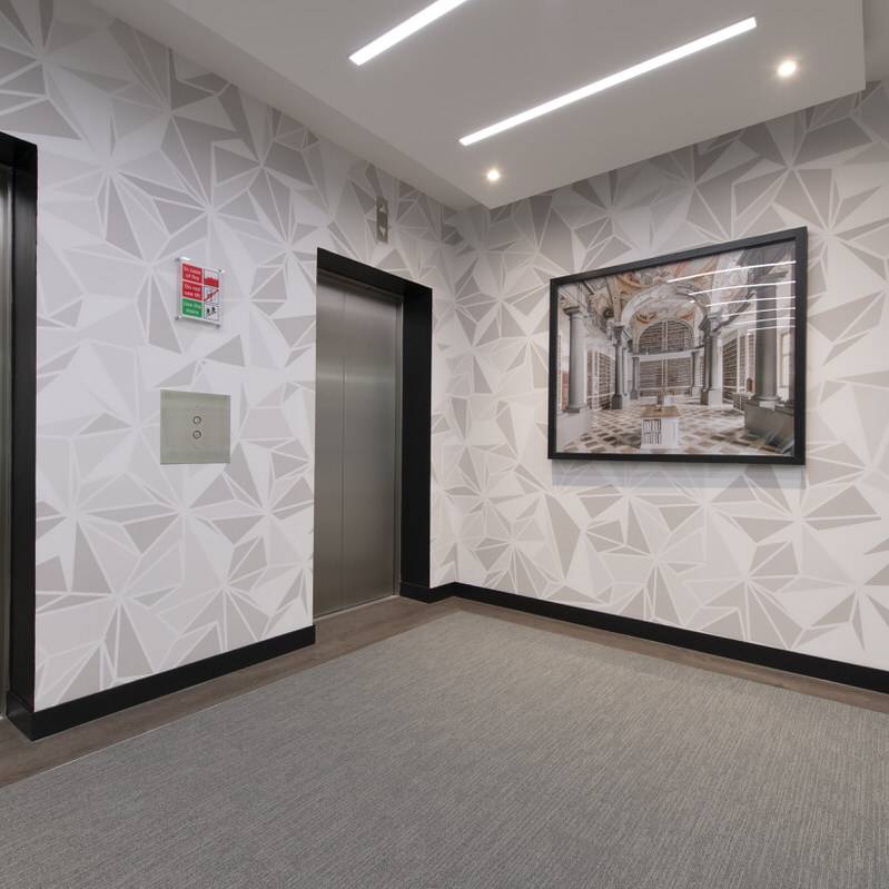 02 Park Street - Workplace Lobby - suspended ceiling raft, digital vinyl clad wall covering - timeless design
