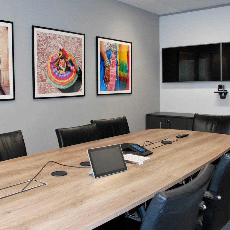 15 Abercrombie & Kent - boardroom table with exotic travel photography