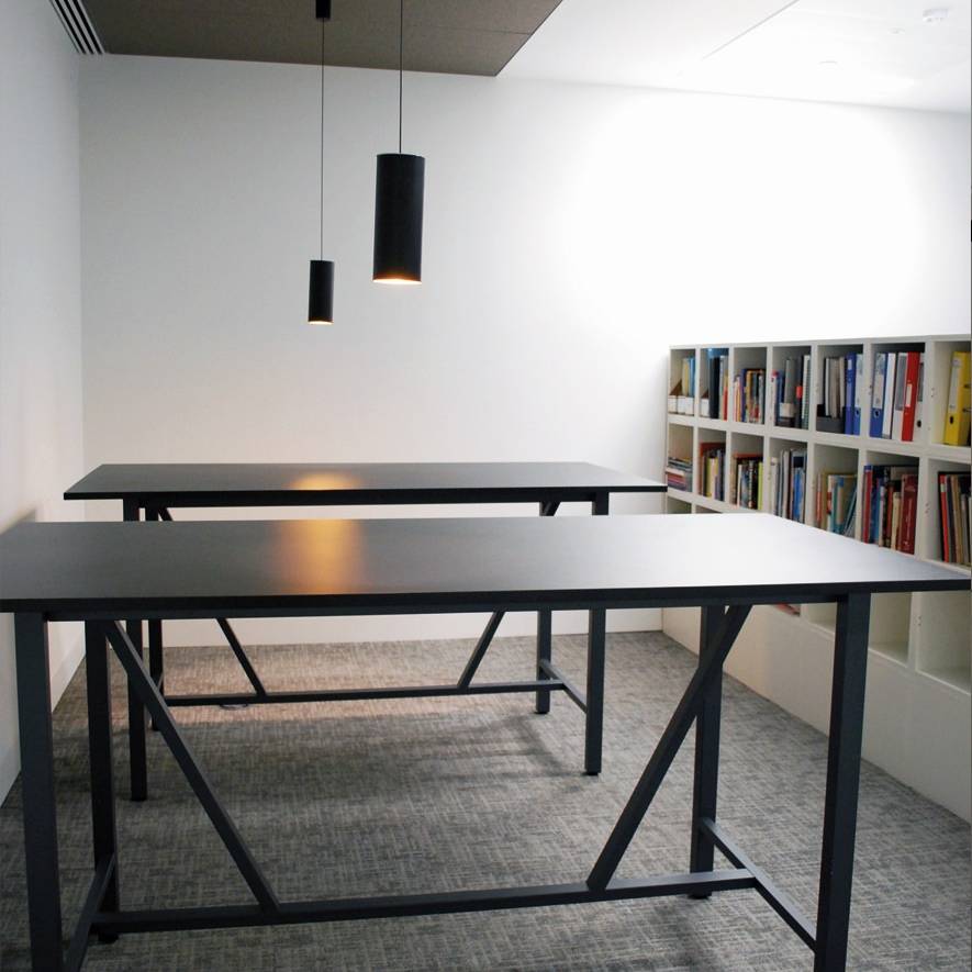 15 Ankura. Workplace library and poseur height meeting tables