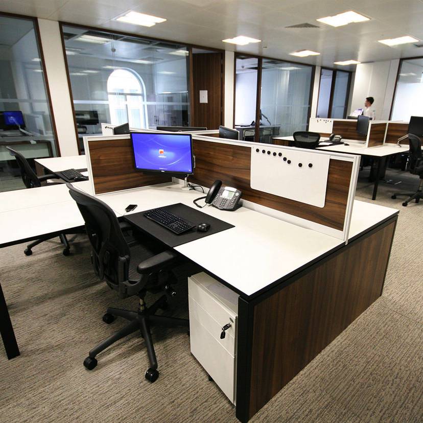 20 Bowmark Capital open plan single L shaped desks